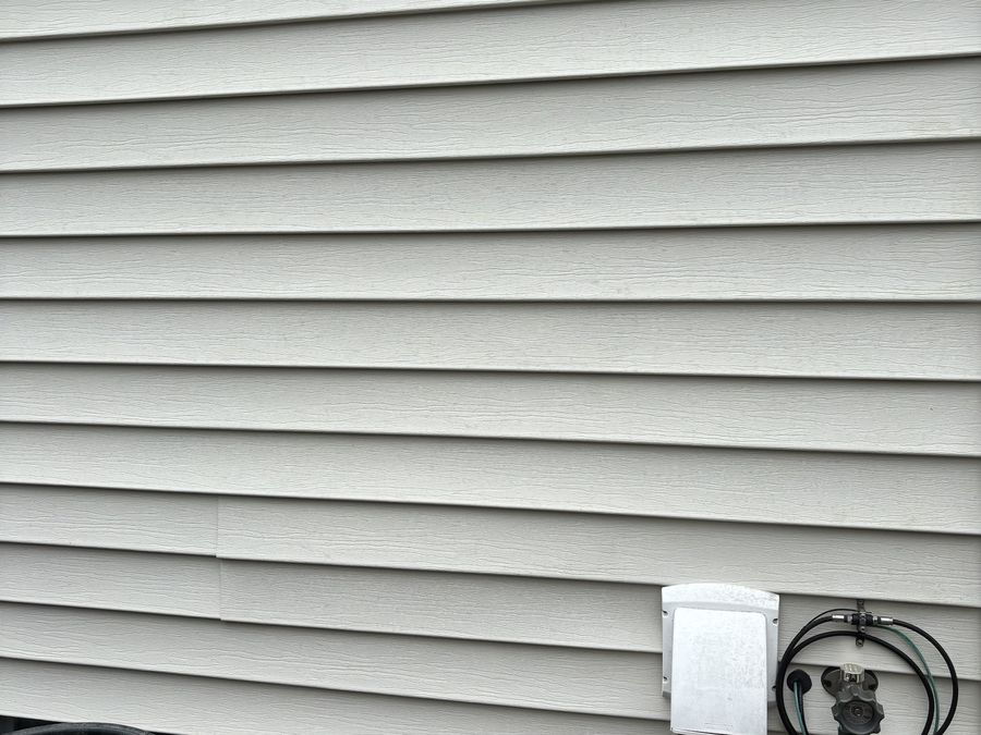 House siding after soft washing — clean and uniform